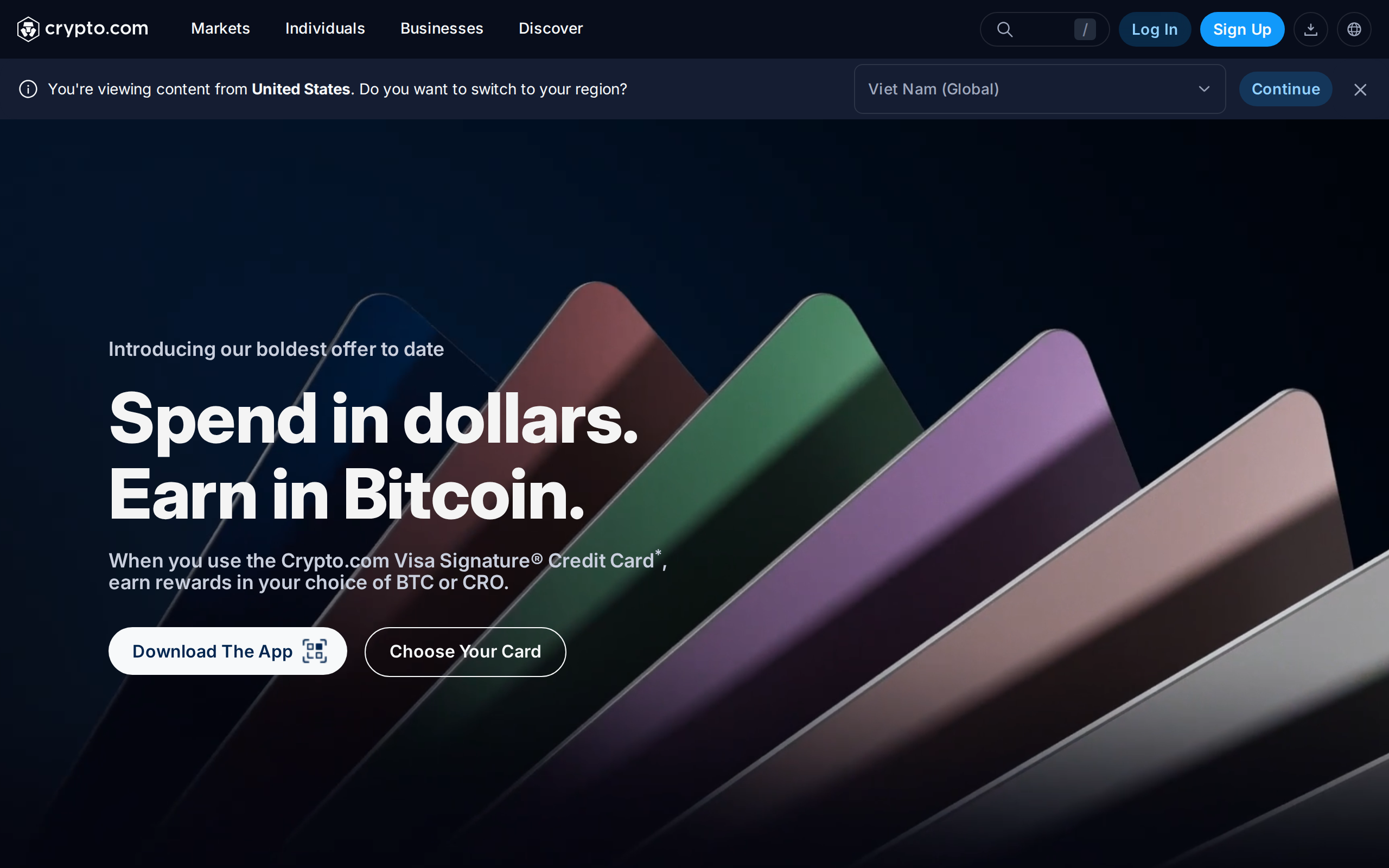 Crypto.com Visa Signature credit card page with the heading Spend in dollars. Earn in Bitcoin.